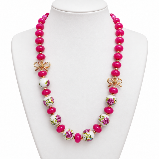 Collar Floral Rosa con Lazos Dorados
